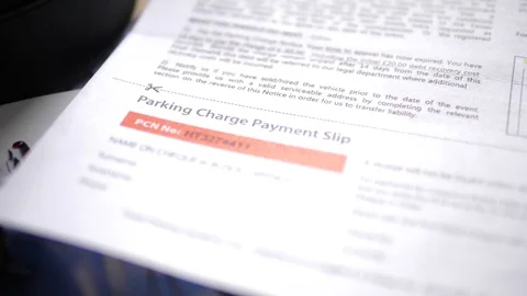 Close up of final demand for payment of parking ticket Stock Footage 78379300