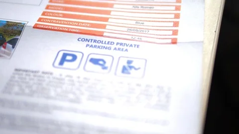 Close up of final demand for payment of parking ticket Stock Footage 78380265