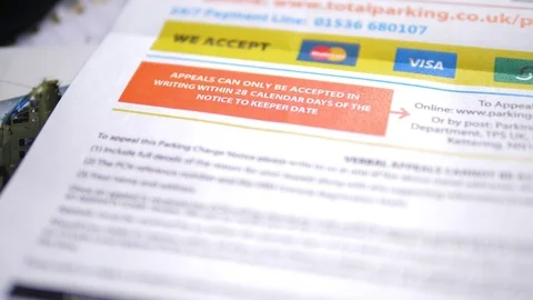 Close up of final demand for payment of parking ticket Stock Footage 78381218