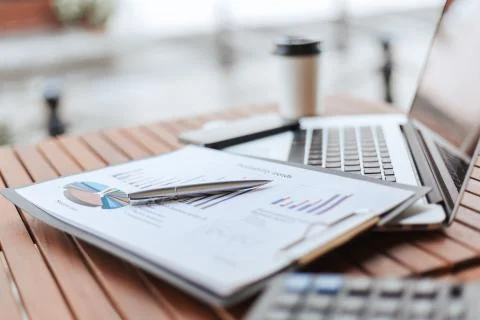 Close up. financial chart on the table in the cafe . Stock Photos