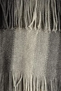 Close-up of fine-checked woolen texture in gray. Stock Photos
