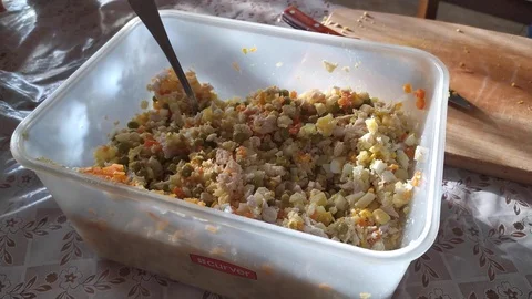 Close-up. finely chopped vegetables and meat. salt is poured into a salad Video stock 121004384