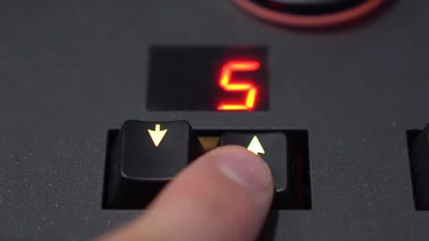 Close-Up Finger Changing Preset with Arrow Buttons on Lighting Mixer, 4K Stock Footage 322518078