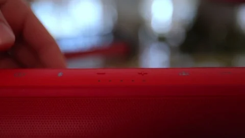 Close-up on finger connecting bluetooth speakers with smartphone. 스톡 동영상 105056057