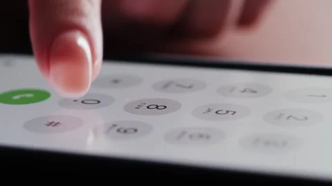 Close up of finger dialing pin or phone number on screen smartphone. Stock Footage 308539028