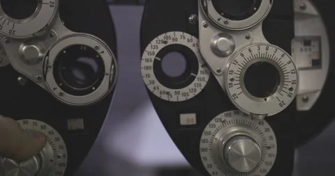 Close up on finger doing micro adjustment on lens Stock Footage 239665428