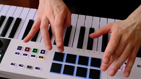 Close-Up Finger Drumming on MIDI Controller Pads Beat Making 库存影片 331908921