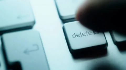 Close up of a finger fast pressing the delete key Video stock 39637688