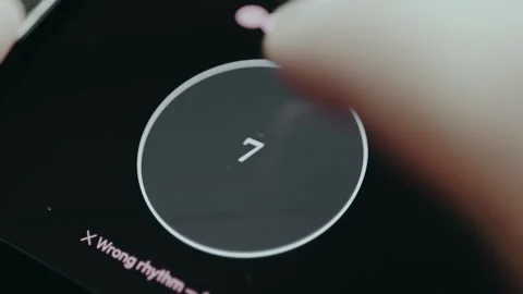 Close-up of finger following pattern to allow payment, Wrong rhythm Stockbeeldmateriaal 332498521