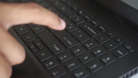 Close Up of Finger Pressing Enter Key on Modern Keyboard Stock Footage 322205944