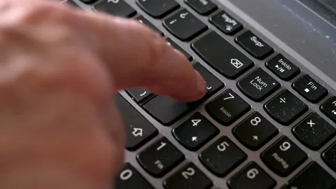 Close-Up Of Finger Pressing Enter Key On Computer Keyboard. Slow motion Stock Footage 332657004