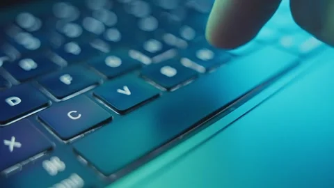Close up on finger pressing the long narrow Space key or button on laptop Stock Footage 340234115