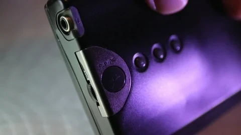 Close-up on finger pressing play button on stereo cassette player. Stock-Footage 104989580