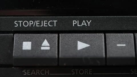 Close-up of a finger pressing the play button on an old video player. Stock Footage 306403111