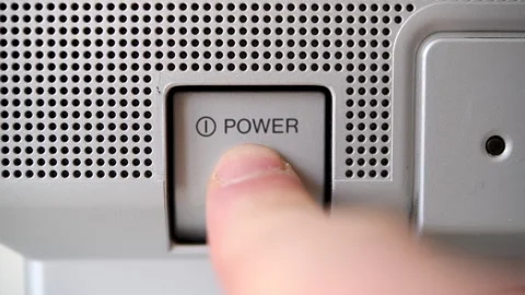 Close-up of finger pressing power button on old TV. Stock Footage 306228684