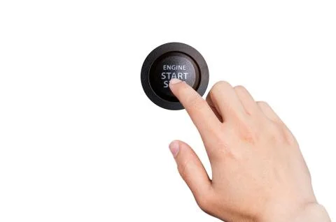 Close up of finger pressing the start/stop engine button on a car. Stock Photos