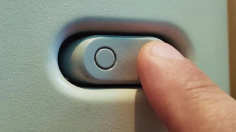 Close-up of a finger pressing a toggle switch Stock Footage 315340261