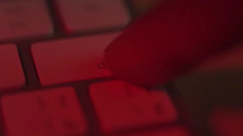 Close-up, finger quickly and many times presses the key of the keyboard delete Stock Footage 150482788