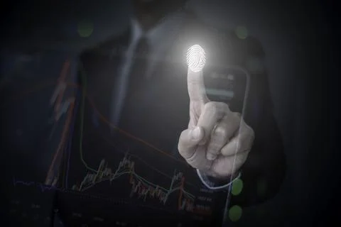 Close up finger touch for finger scan to authentication on device data accessing Stock Photos