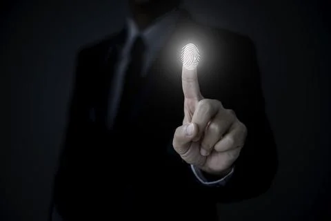 Close up finger touch for finger scan to authentication on device data accessing Stock Photos