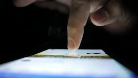 Close-Up Finger Touch Screen Smartphone Tablet Display, Night Web Stock Footage 100097927