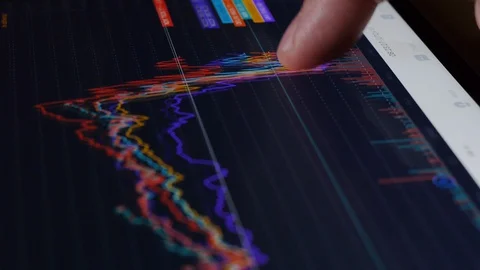 Close up finger Touch On Tablet Computer Screen With Stock Market Graph 스톡 동영상 127821004