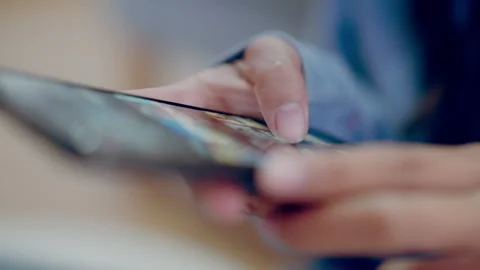 Close up of finger touching on screen mobile phone, Hand woman slide device.. Stock Footage 252278377