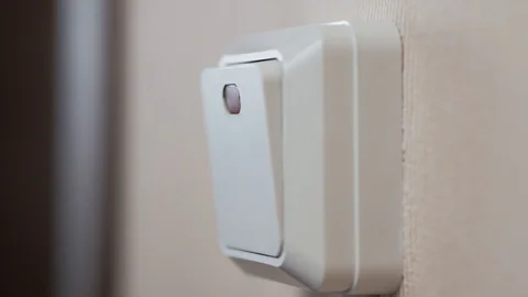 Close up of finger is turning on or off on light switch. Macro super 스톡 동영상 87304931
