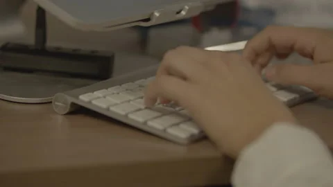 Close up finger typing on a computer keyboard Stock Footage 134582772