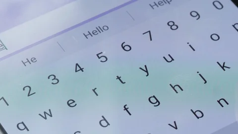 Close up finger typing keybard on screen smartphone or tablet touchscreen Stock-Footage 129112056