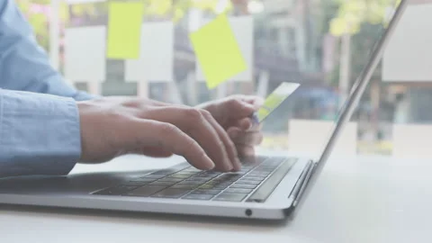 Close-up of the finger, Young man pressed the credit card code to pay online Stock Footage 152575859