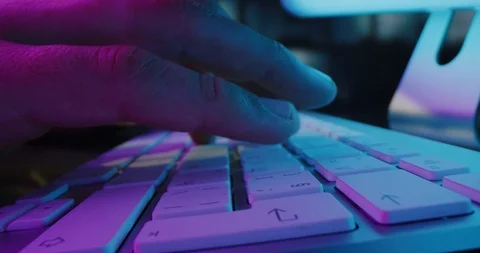 Close Up Of Fingers Coding On Computer Keyboard Dim Lit Quantum Computing Cyber Video stock 122152827