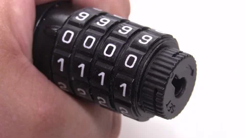 Close-up of fingers opening a combination lock Video stock 134603502