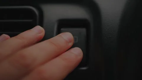 Close-up of fingers pressing the rear window... 스톡 동영상 339101317