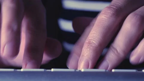Close up of fingers that typing keyboard in the evening. Concept of human and  Stock Footage 143536744