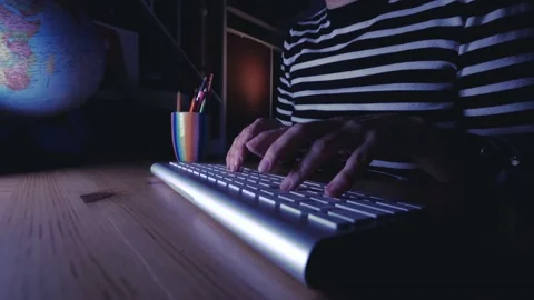 Close up of fingers that typing keyboard in the evening. Concept of human and  Stock Footage 143537473