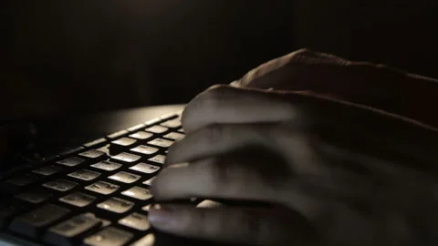A close-up of fingers typing on keyboard Vidéo 88760919