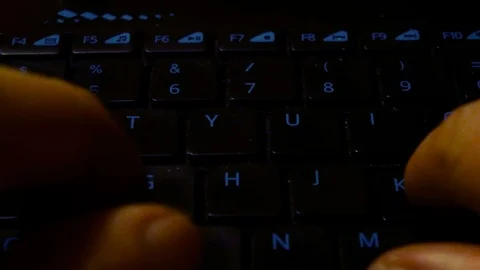 Close up on fingers typing on a keyboard of a personal computer Stock Footage 87685964