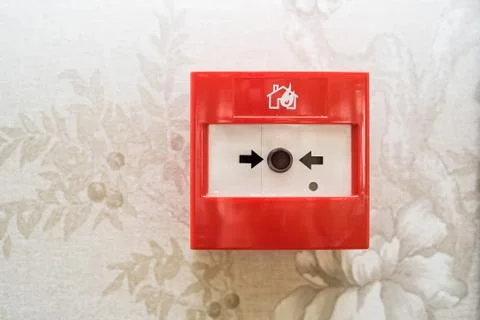 Close up of fire alarm switch in red box on wall Foto stock