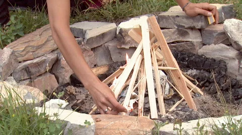 Close up of a fire being lit. Video stock 110173