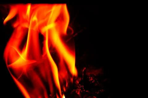 Close-up fire on black background Stock Photos