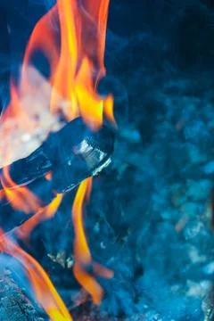 Close-up fire on black background Stock Photos