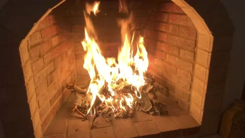 Close up of fire burning in fireplace in living room. vintage interior design an Stock-Footage 165508028