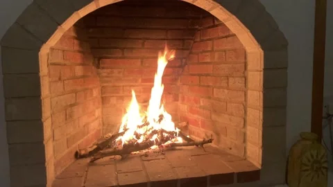 Close up of fire burning in fireplace in living room. vintage interior design an Stock Footage 166893009