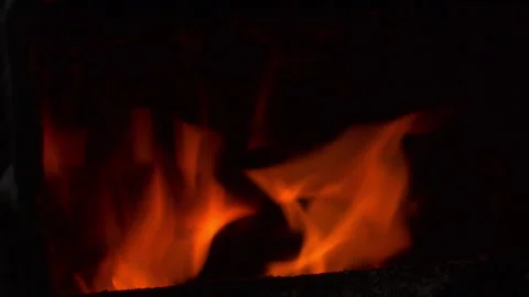 Close-up of Fire Burning Inside Metal Heating Boiler in Dark 库存影片 331504948