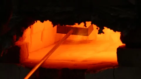 A close up of a fire coming out of a hole in a wall Stock Footage 274741050