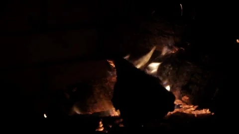Close up of fire embers crackling in the wind Stock Footage 103966947