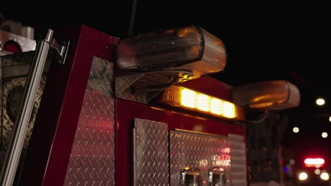 Close Up of Fire Engine Side Emergency Lights Flashing at Night Vídeo Stock 343883134