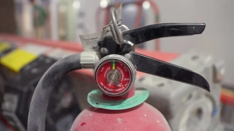 Close-Up of Fire Extinguisher in Workshop 스톡 동영상 313849774
