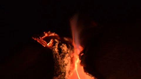 Close up of fire in a fireplace in the night with very shallow focus area. Stock Footage 96364900